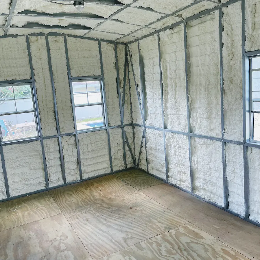 Closed-cell spray foam insulation applied to wall cavities in a residential project in Wilmington