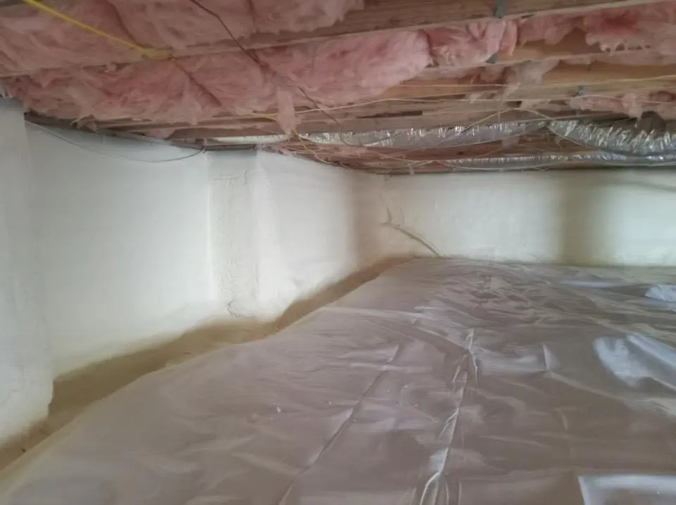 Crawl space encapsulation with closed-cell spray foam for Storm Damage Roof Repair in Wilmington